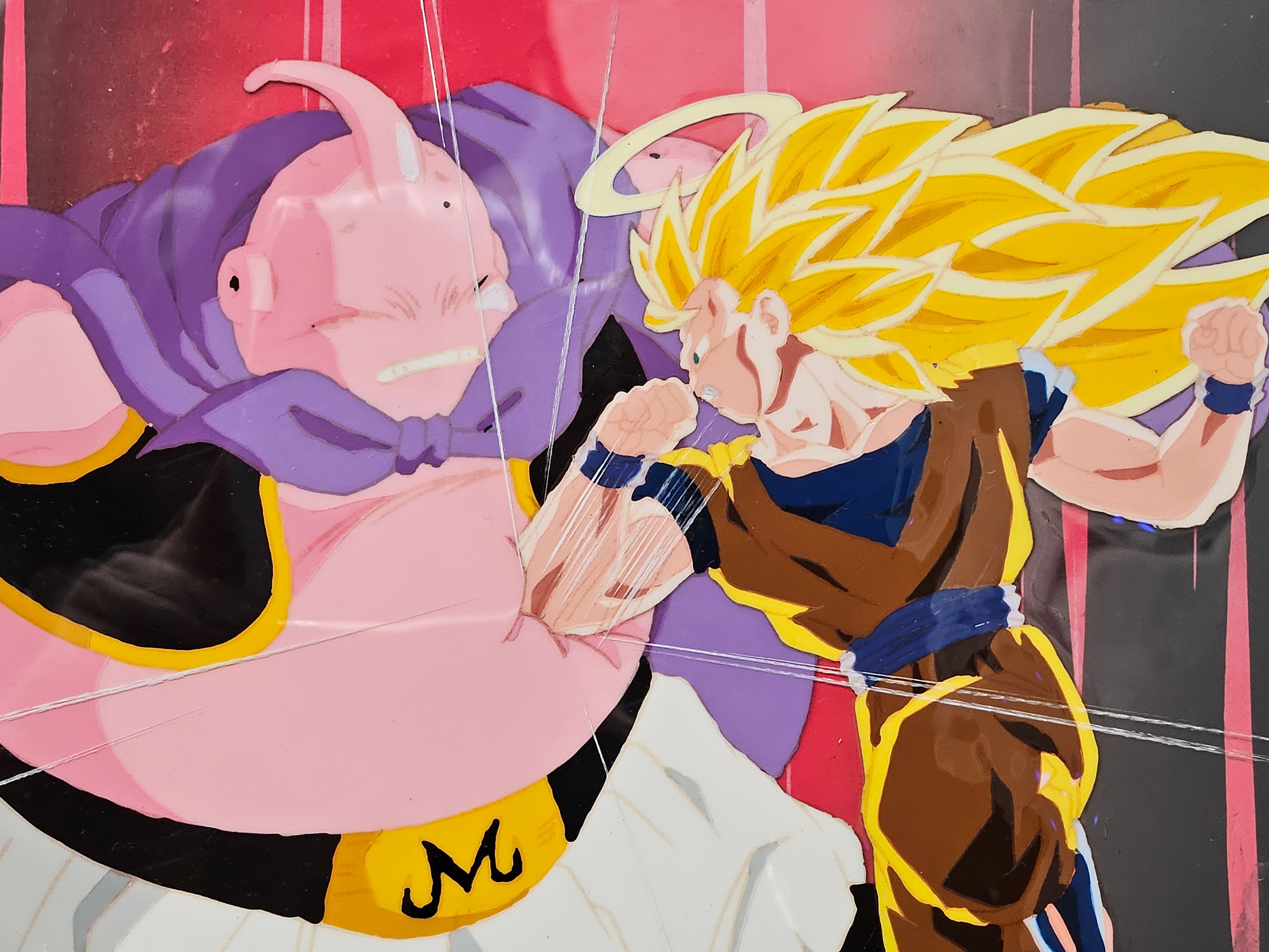 《龙珠》原版赛璐璐胶片与原画草图（魔人布欧 vs. 孙悟空）